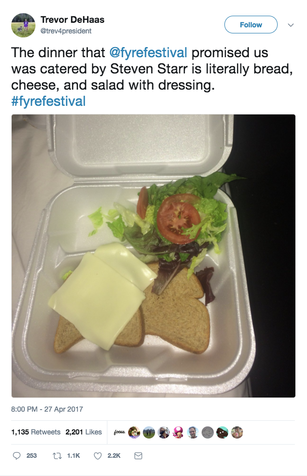 Screenshot of a tweet by Trevor DeHaas reading The Dinner that fyre festival promised us catered by Steven Starr is literally bread, cheese, and salad with dressing. An image of bread, cheese, and salad with dressing in a styrofoam container. 