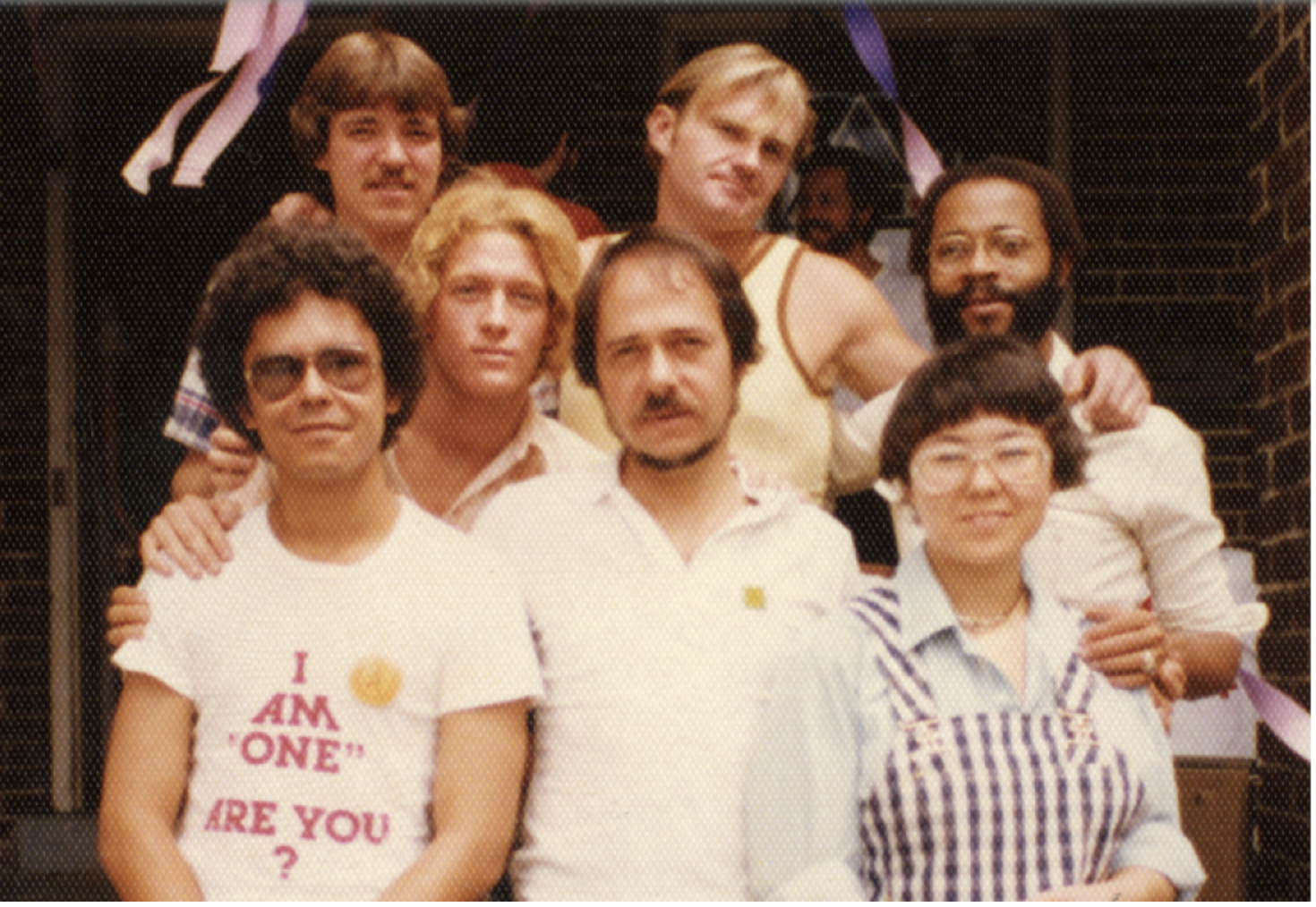 Photo of a group of individuals from 1977, standing in front of what is now the Center on Colfax