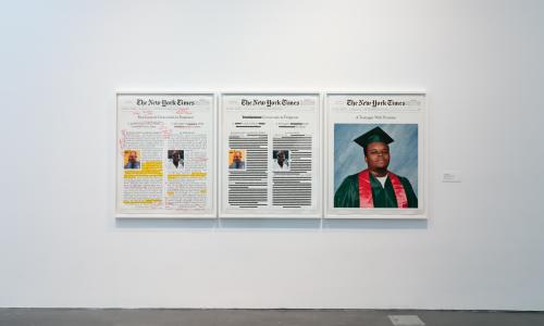 [Image description: An installation image of a work by Alexandra Bell hung on a white wall in one of the MCA Denver galleries. The work is a framed triptych with annotations of front-page layouts of the headlines in the NYT that report on the murder of Michael Brown.]